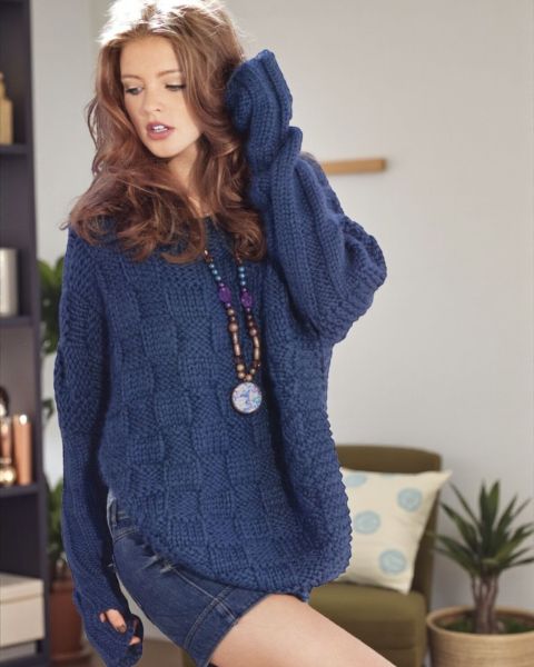 Poncho with integrated sleeves